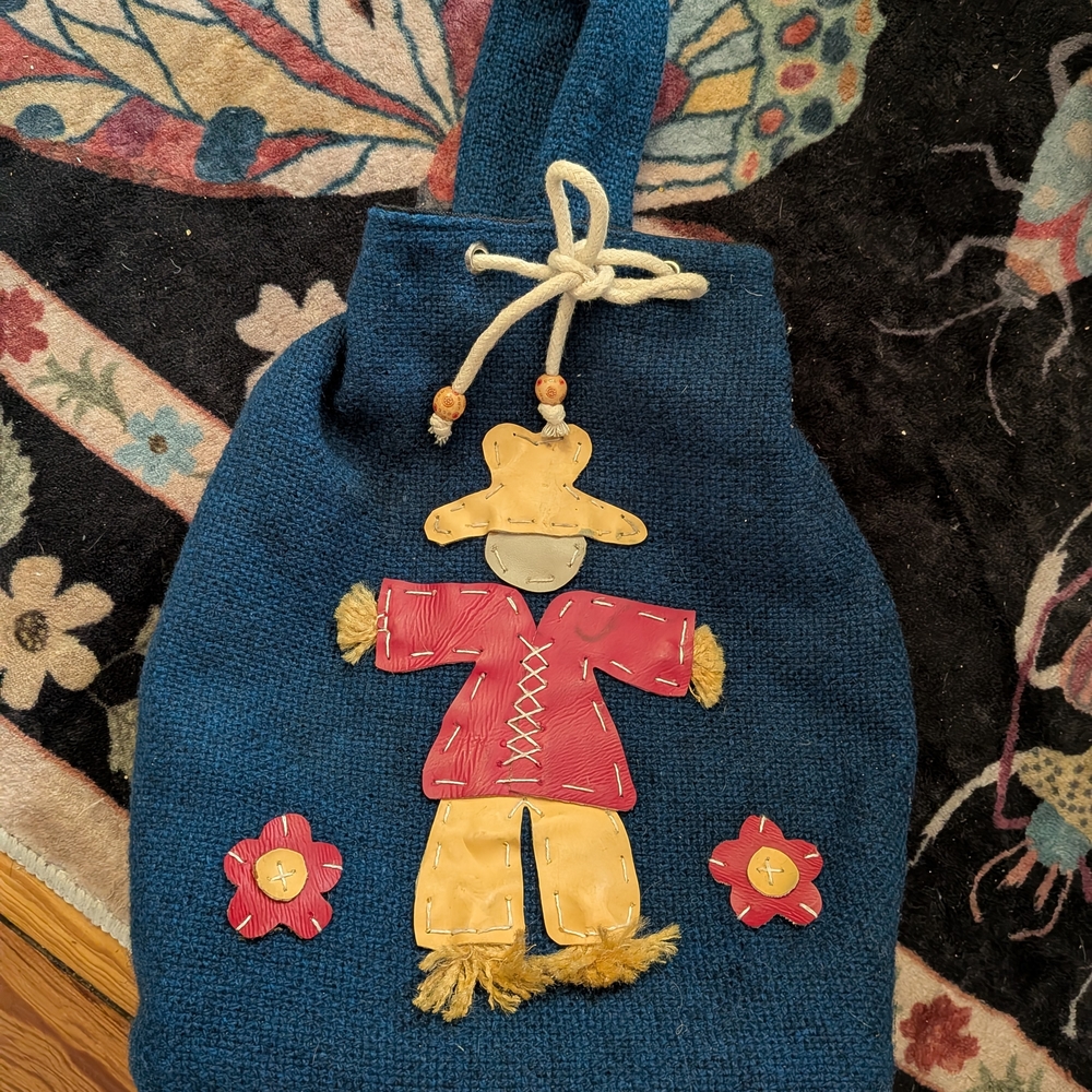 Made In Colombia Blue Knit Drawstring Tote with Scarecrow Applique